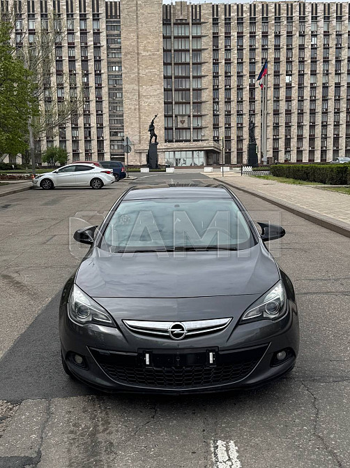Opel Astra J GTC 2012  - изображение 8