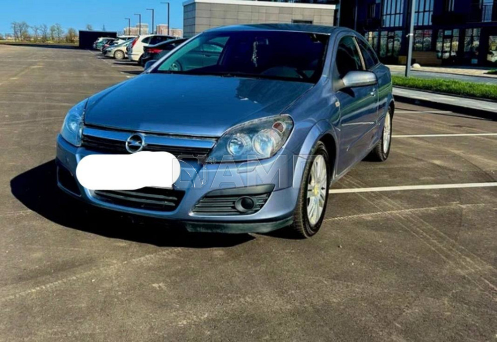 Opel Astra GTC H Рестайлинг 2008  - изображение 5