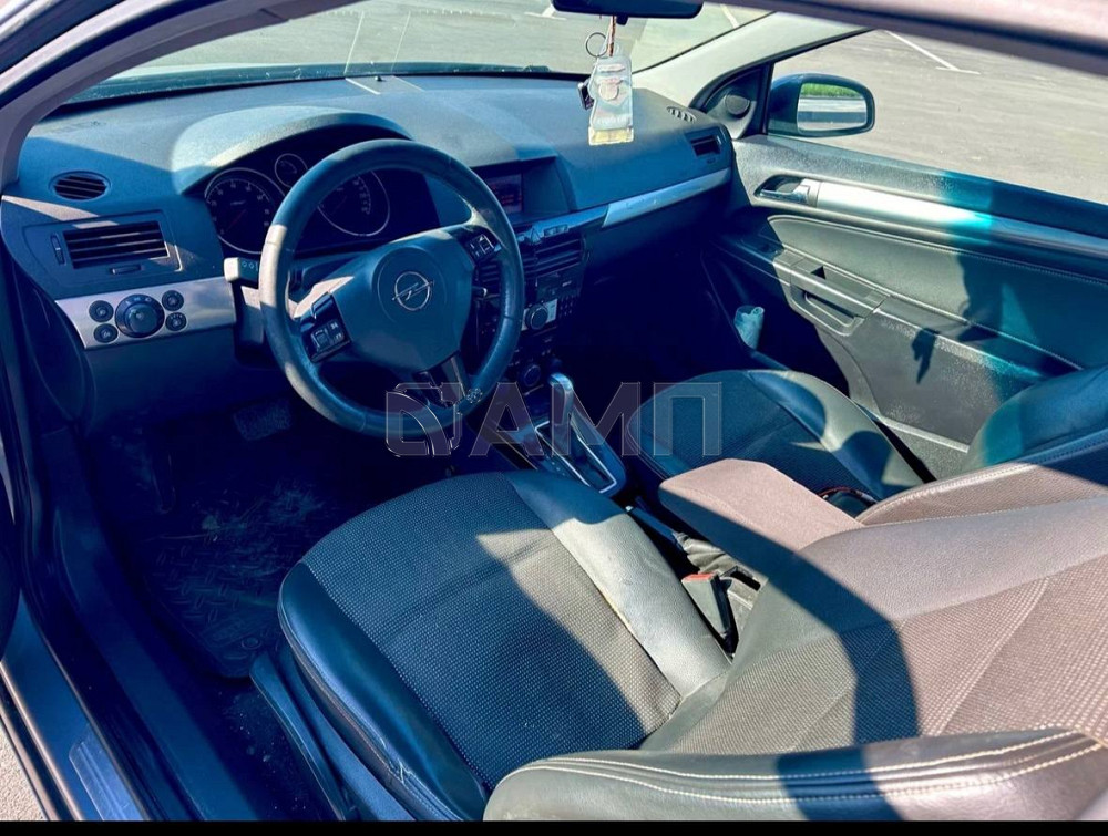 Opel Astra GTC H Рестайлинг 2008  - изображение 1