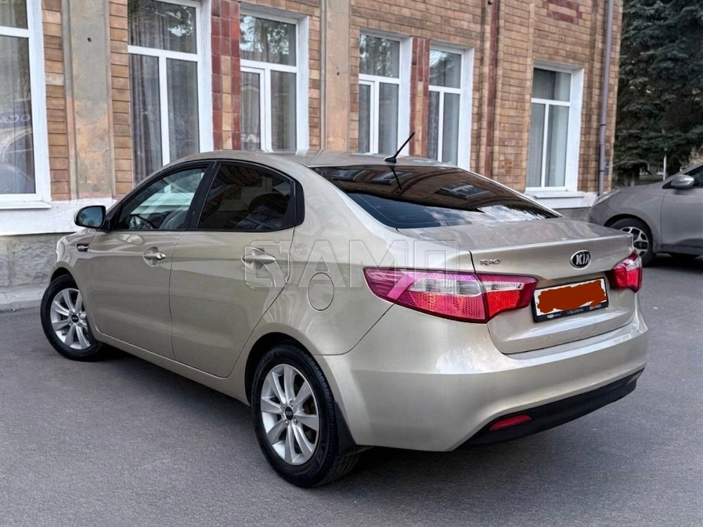 KIA Rio 2014  - изображение 8