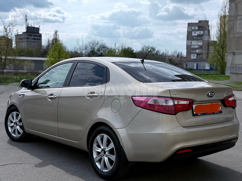 KIA Rio 2014  - изображение 5