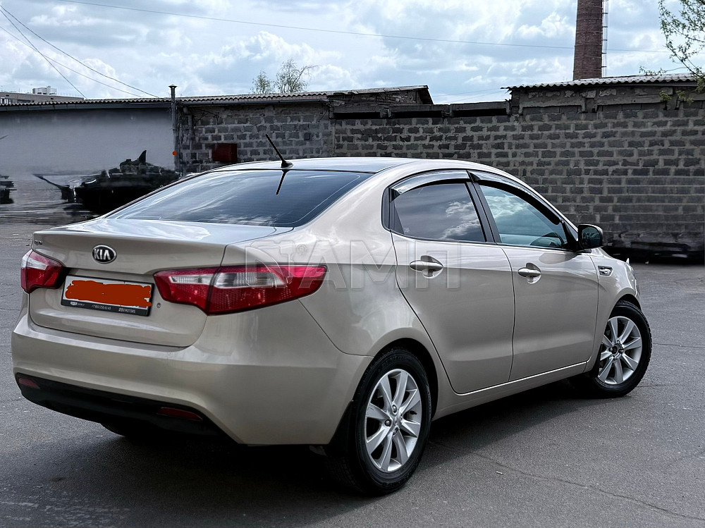 KIA Rio 2014  - изображение 4