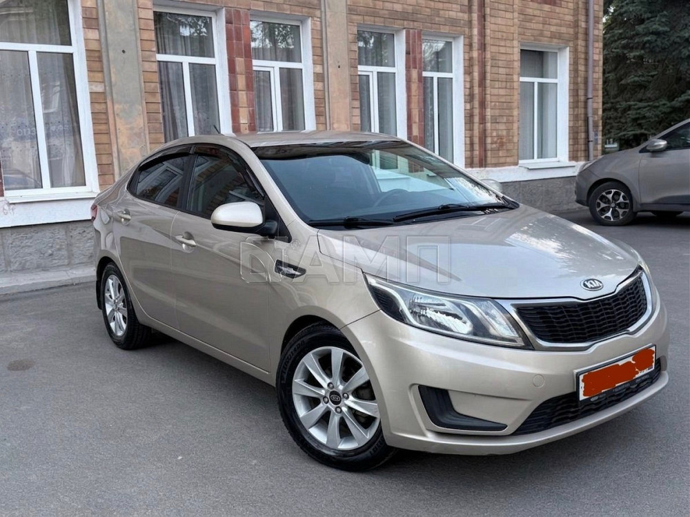 KIA Rio 2014  - изображение 10