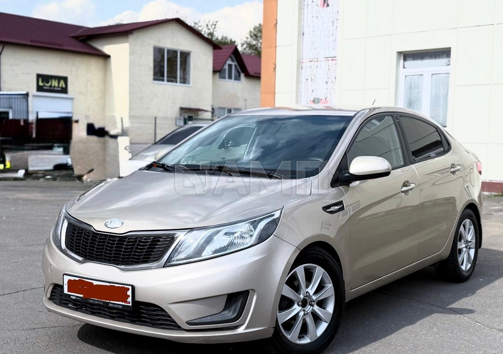 KIA Rio 2014  - изображение 7