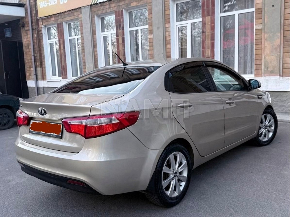 KIA Rio 2014  - изображение 9