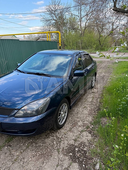 Mitsubishi Lancer 9  - изображение 8