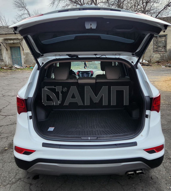 Hyundai Santa Fe 2016 Снежное - изображение 7