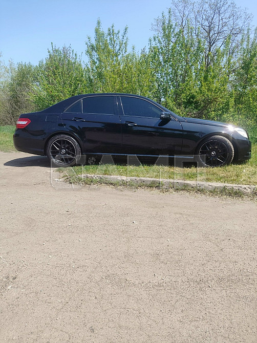 Mercedes-Benz E-Class 2010  - изображение 3