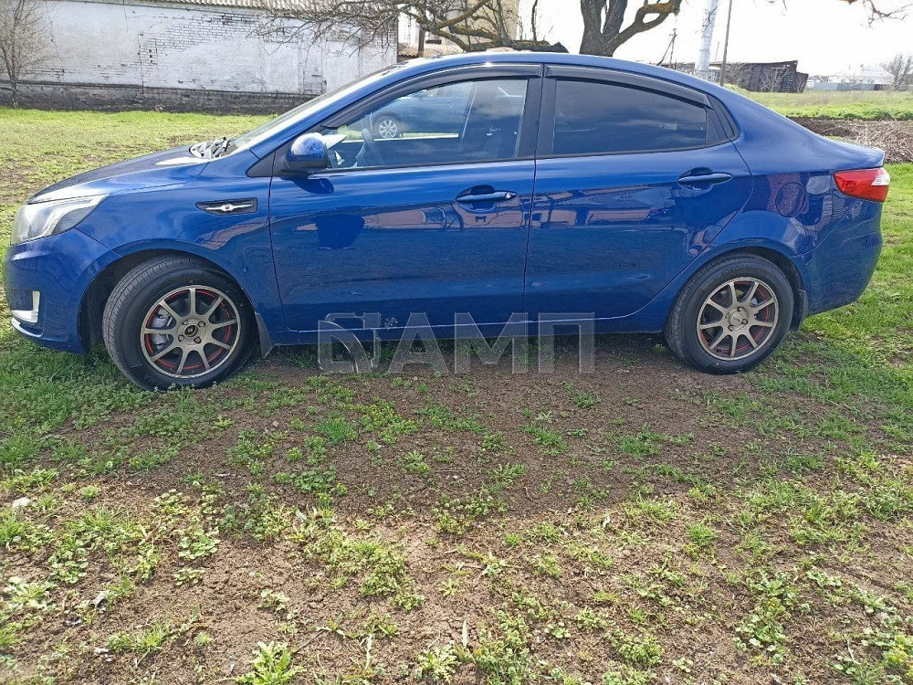 KIA Rio 2012  - изображение 8