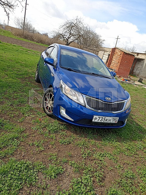 KIA Rio 2012  - изображение 9