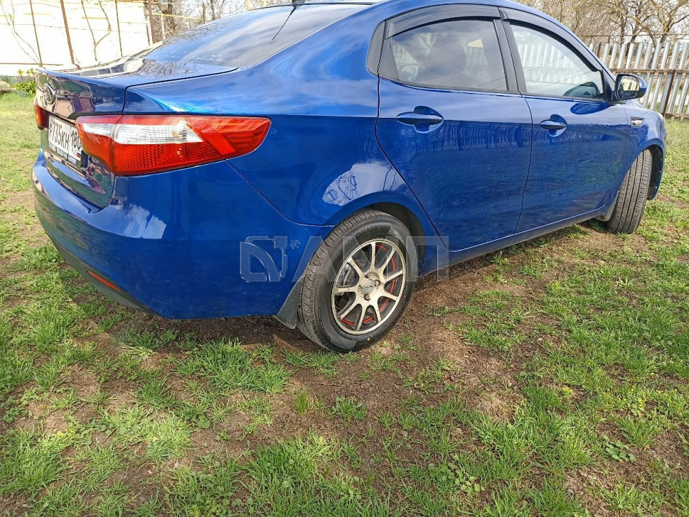 KIA Rio 2012  - изображение 7