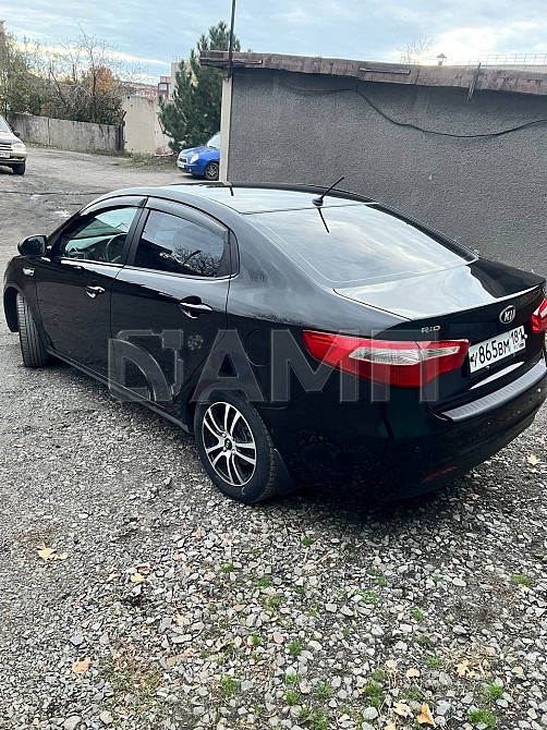 KIA Rio 2013 Красный Луч - изображение 8