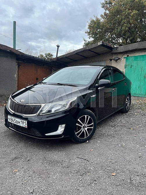 KIA Rio 2013 Красный Луч - изображение 10