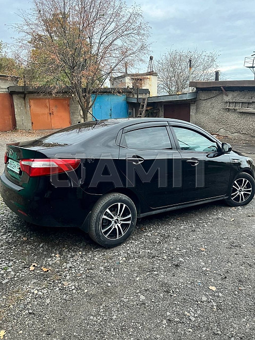 KIA Rio 2013 Красный Луч - изображение 7