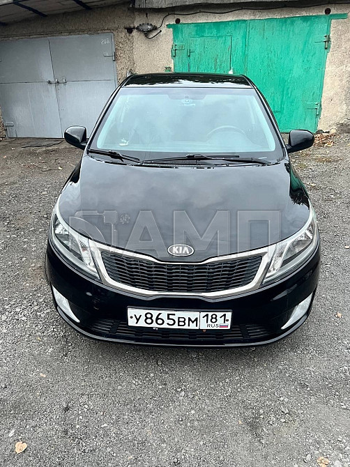 KIA Rio 2013 Красный Луч - изображение 9