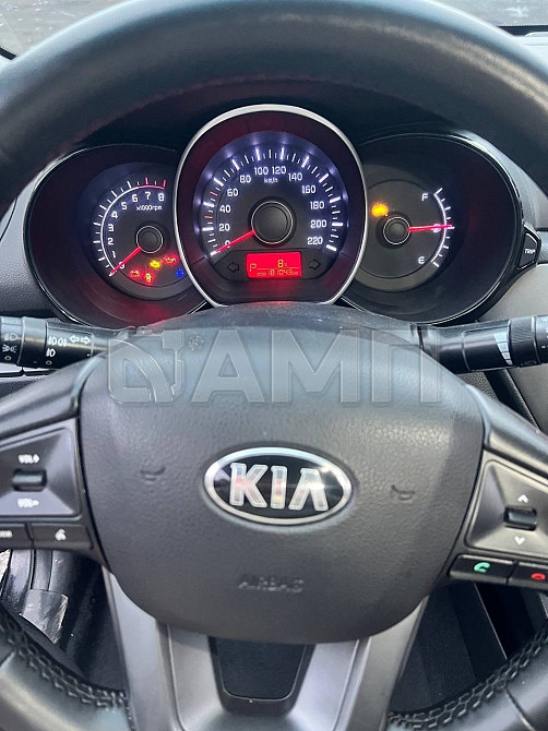 KIA Rio 2013 Красный Луч - изображение 1