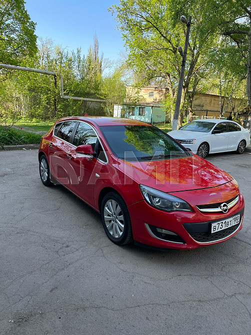 Opel Astra 2012  - изображение 8