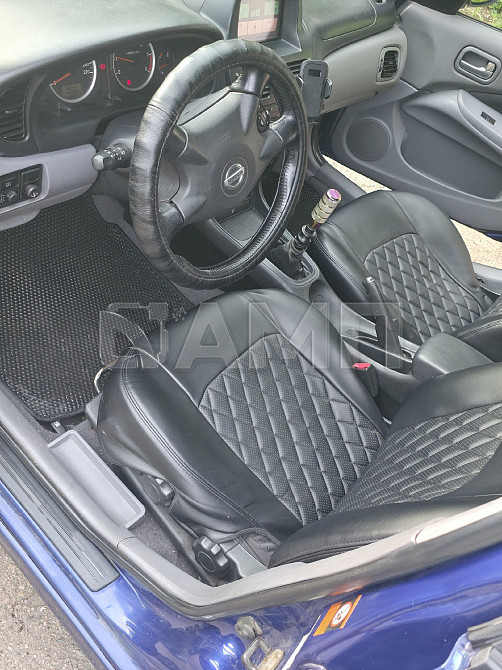 Nissan Almera 2004  - изображение 7