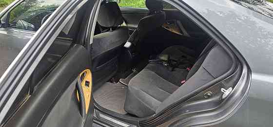 Toyota Camry 2006 Красный Луч