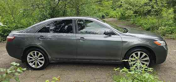 Toyota Camry 2006 Красный Луч