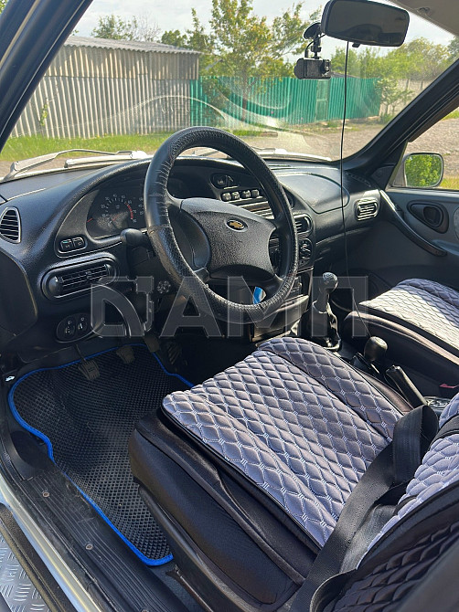 Chevrolet Niva 2004 Макеевка - изображение 1