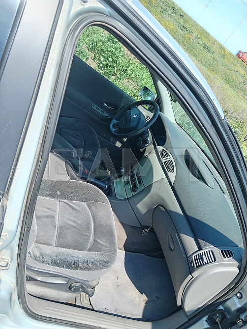 Renault Лагуна 2002  - изображение 7
