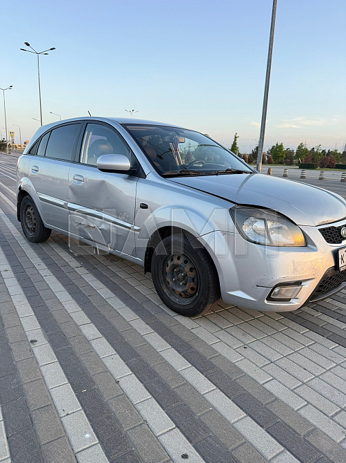 KIA Rio 2010  - изображение 7