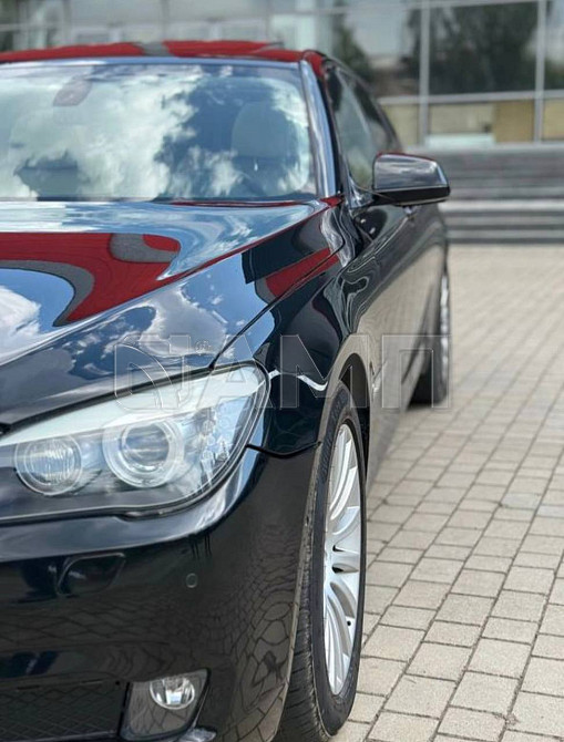 BMW 750 2009  - изображение 7