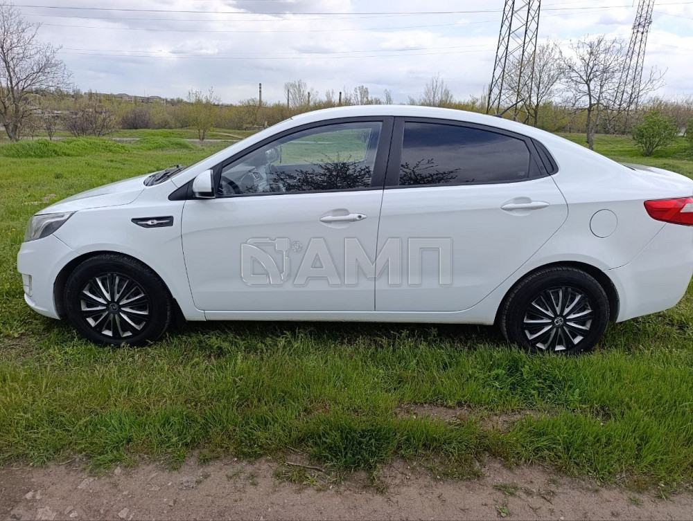 KIA Рио 2014  - изображение 9