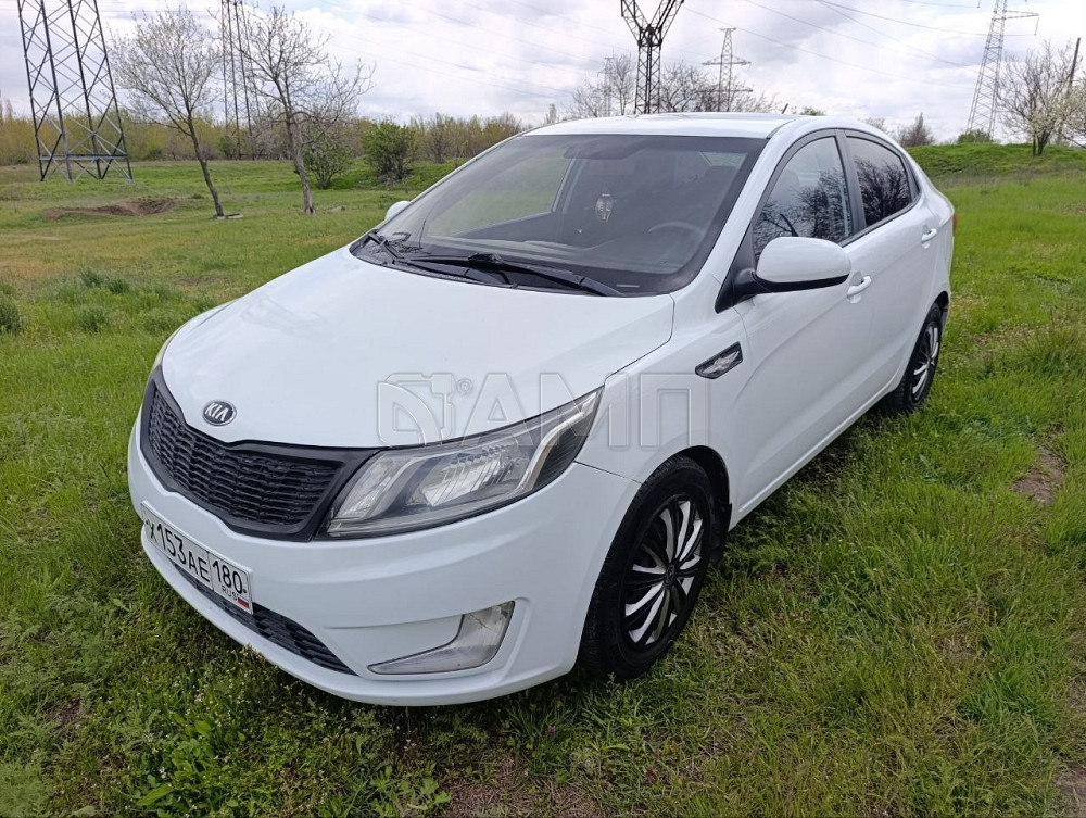 KIA Рио 2014  - изображение 10