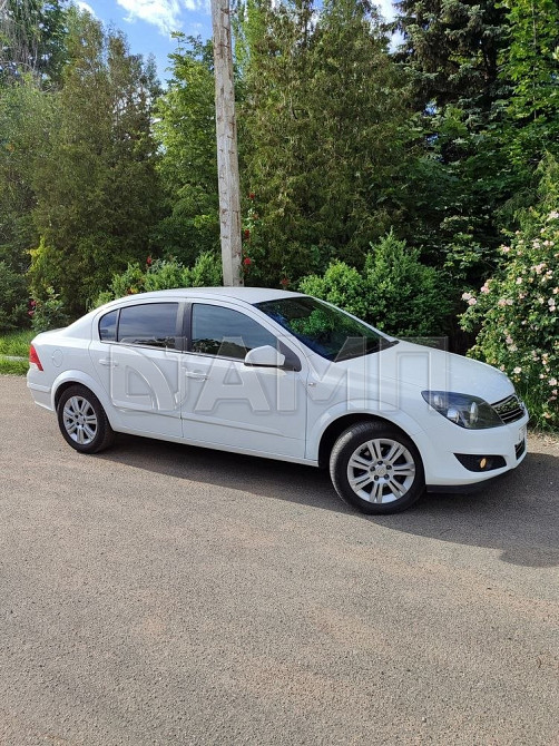 Opel Astra 2012  - изображение 7