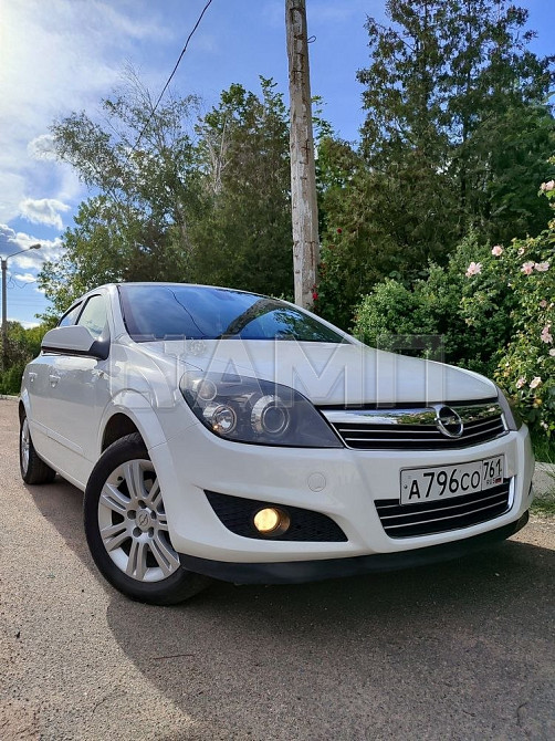 Opel Astra 2012  - изображение 8
