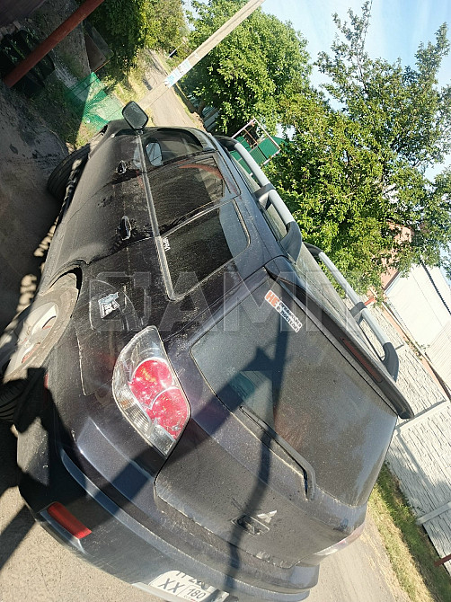 Mitsubishi Outlander  - изображение 1