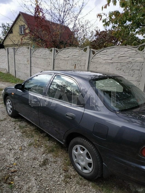 Mazda 323 1998 Донецк - изображение 1